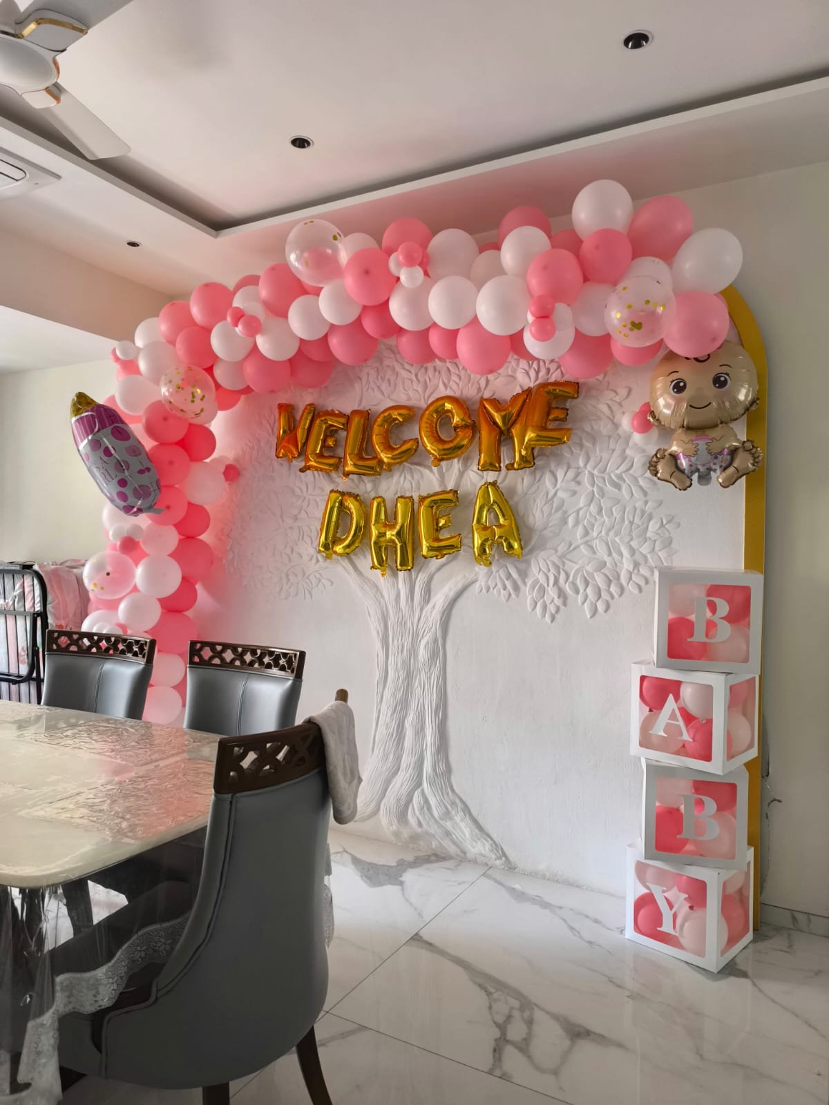 Pink and white Welcome Baby balloon arch with BABY blocks decoration by Star Balloon Mumbai